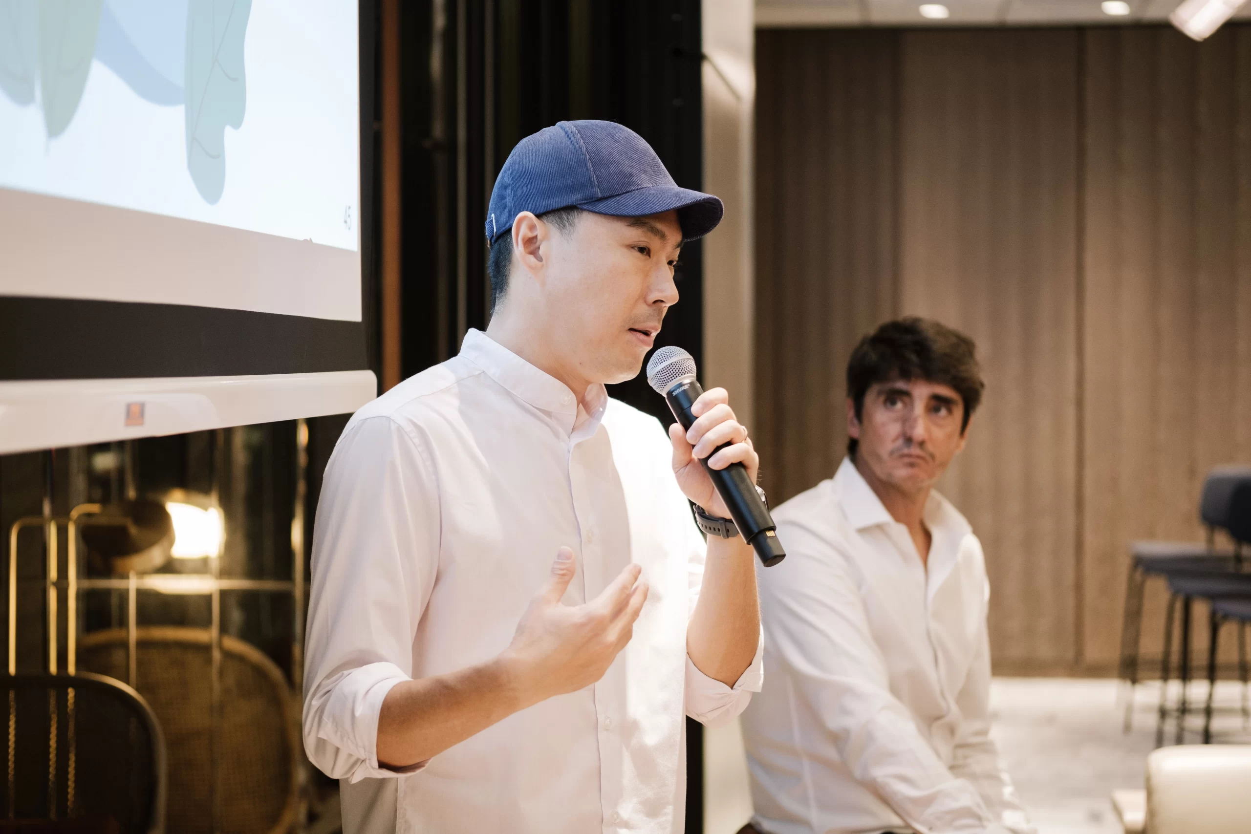 greater member Sang Shin speaking at the event